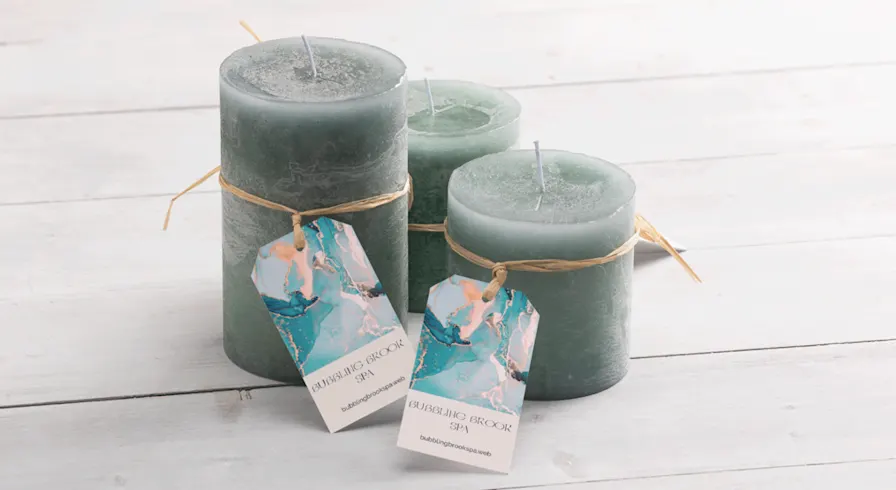 Set of Ocean Breeze Candles in glass jars with seashells, driftwood, and soft blue tones.