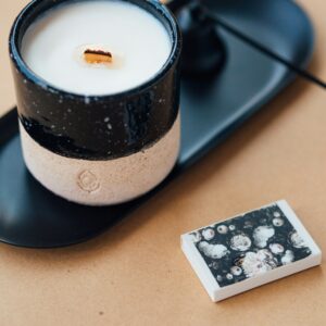Clean burning candles featuring vanilla, cinnamon, and pine fragrances that is hand-poured made in Maryland featuring natural soy wax