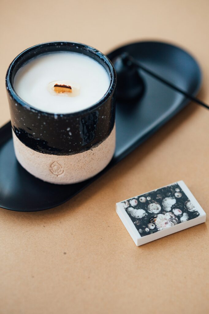 Clean burning candles featuring vanilla, cinnamon, and pine fragrances that is hand-poured made in Maryland featuring natural soy wax