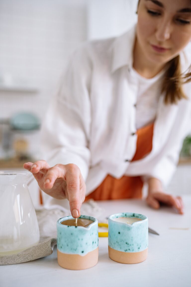 Family-owned candle business owner hand-pouring candles in Salisbury Maryland